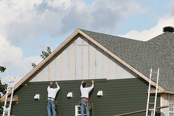 Professional Emergency Siding Repair technician working in Perry, FL